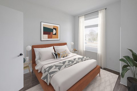 a bedroom with a large bed and a window at The Indie, Boston, MA  