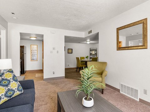 a living room with a couch and a table