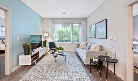 a living room with a couch and a tv