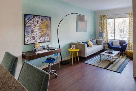 a living room with a couch and a table